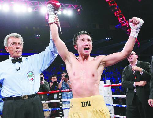 鄒市明重拳擊出中國奧運(yùn)選手新出路