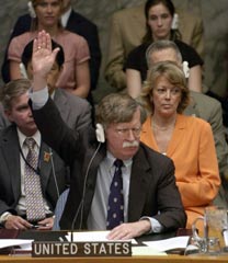 US Ambassador to the UN John Bolton (front C) vetoes a resolution before the UN Security Council condemning Israel for incursions in the Gaza Strip, at the United Nations in New York July 13, 2006. Ten of the 15 member nations voted in support of the resolution, four abstained and the US vetoed.