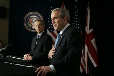 President Bush, right, and British Prime Minister Tony Blair take part in a joint press availability in the Eisenhower Executive Office Building in Washington, Thursday, Dec. 7, 2006. (AP 