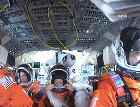 On sixth try, space shuttle lifts off