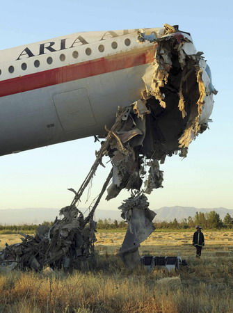 Plane hits wall at Iranian airport, killing 17