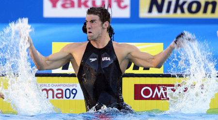 Phelps reels in Cavic to stay butterfly king in Rome