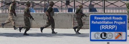 Pakistan commandos free 30 at army HQ, ending siege