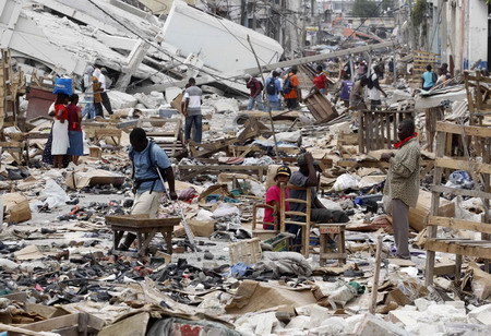 40,000 bodies buried, another 100,000 feared dead