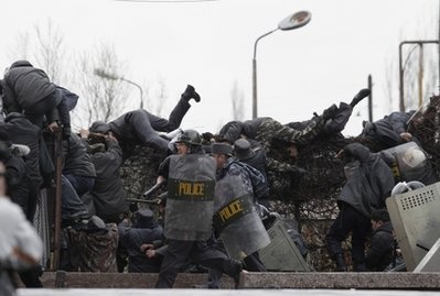 Anti-govt protests sweep Kyrgyzstan, 100 said dead