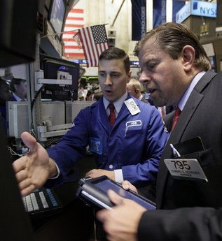 Dow closes above 11,000 for first time since May