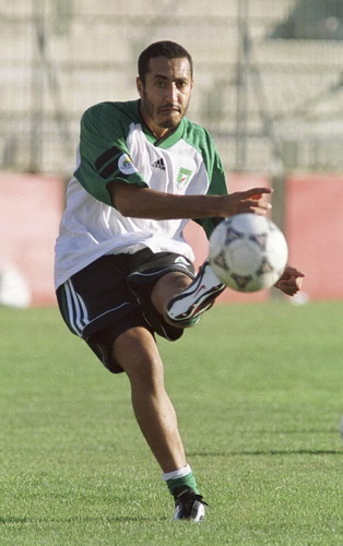 Saadi Gadhafi, son of Muammar Gadhafi, kicks the ball during his team Al-Ahli's training session in Hamrun outside Valletta, in this June 6, 2000 file photo. Football murder probe against Gadhafi's son