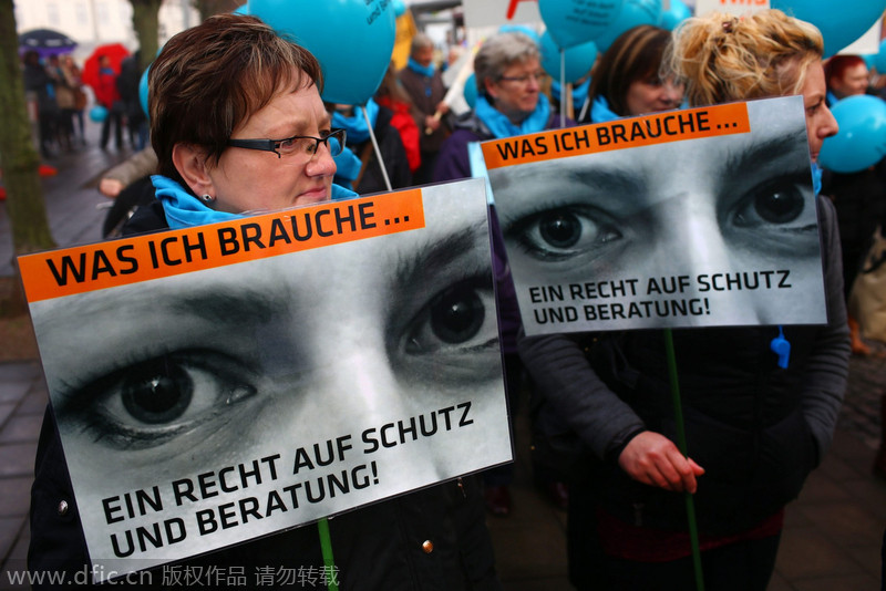 Protesters rally against violence to women