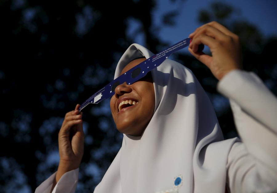 Solar eclipse captivates Asia and the Pacific