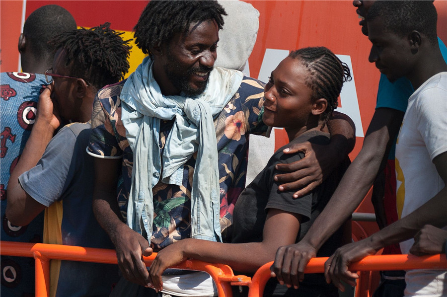 Back to safety: Spanish coast guard rescues African migrants
