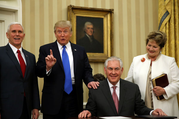 Tillerson, on first day, addresses dissent and calls Mexico, Canada