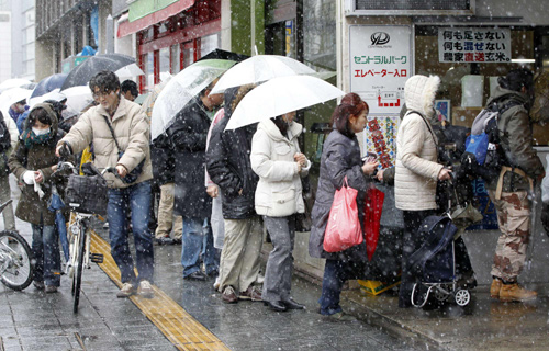 Japan suspends work at stricken nuclear plant